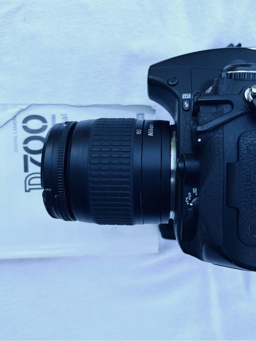 Nikon D700 with 50mm lens, battery grip.